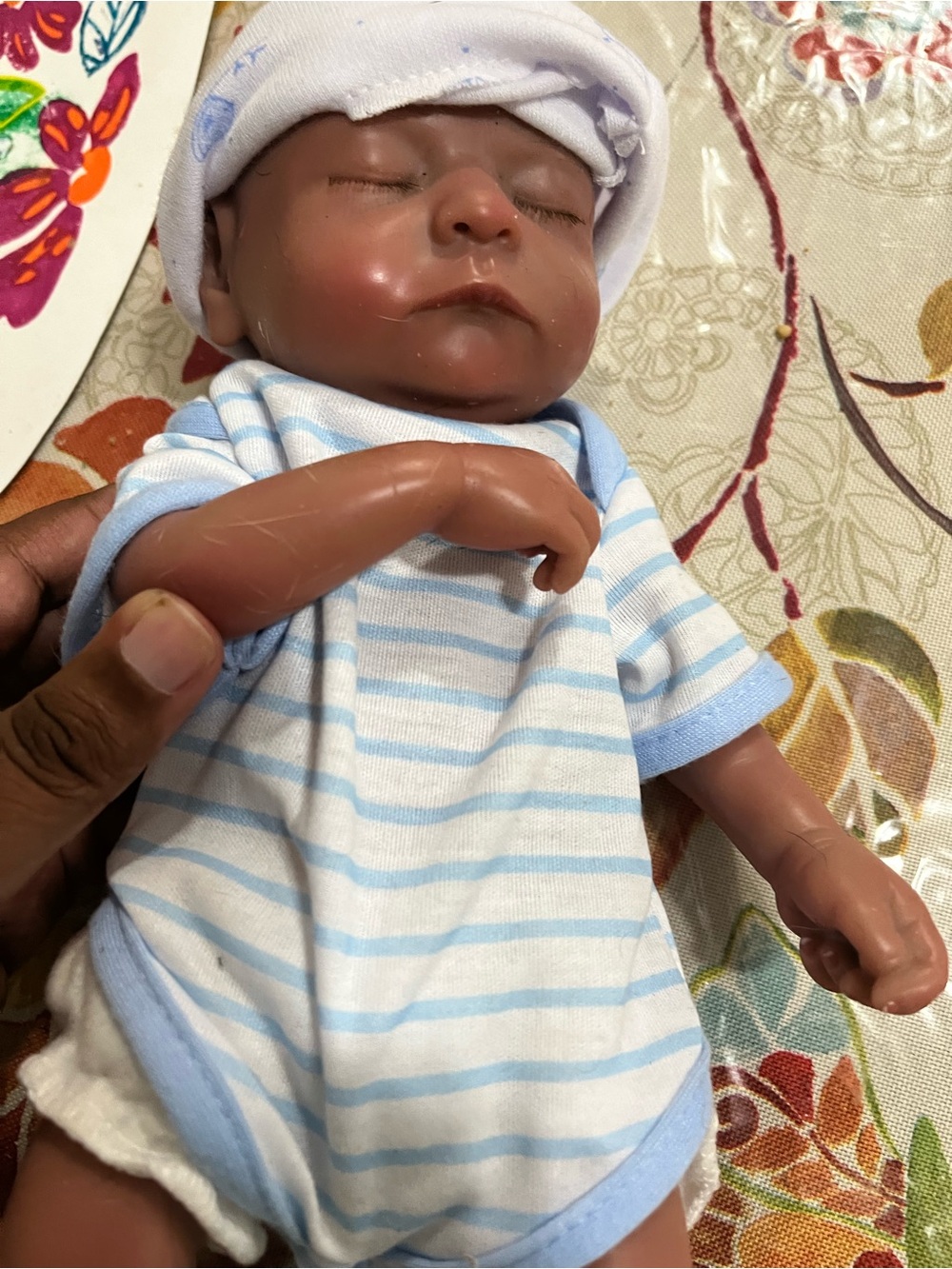Reborn Brown Baby Doll with Blue & White Striped Outfit
